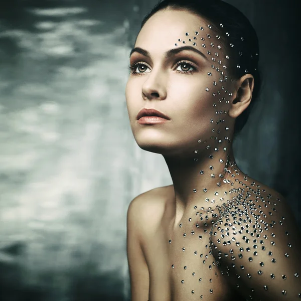 Beautiful young girl with crystals on the body — Stock Photo, Image