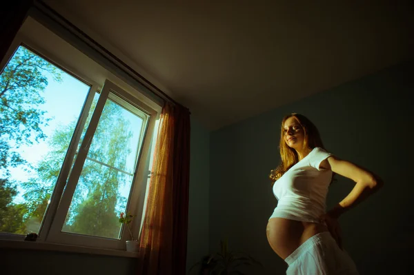 Image of pregnant woman touching her belly — Stock Photo, Image