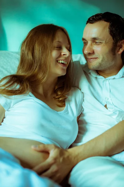 Image of happy future dad looks the belly of his pregnant wife — Stock Photo, Image