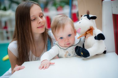 Image of cute little baby with mom