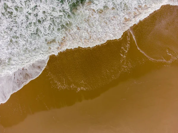 Aerial Drone Top Down View - Waves on a Beach with Golden Sand - Summer Holidays