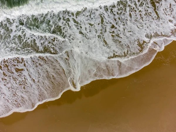 Aerial Drone Top Down View - Waves on a Beach with Golden Sand - Summer Holidays