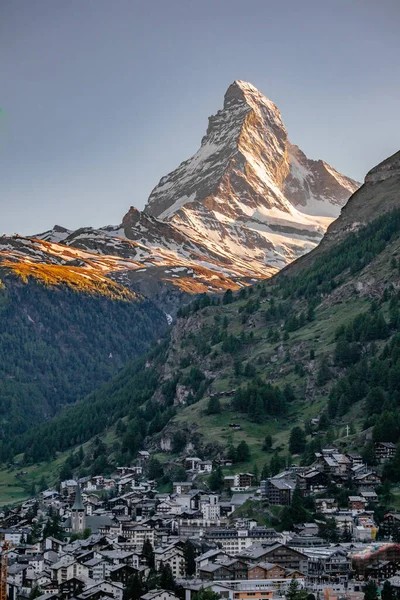 The Mighty and Beautiful Matterhorn Peak with Zermatt in Foreground - The Famous and Iconic Swiss Mountain in the Alps, Zermatt, Valais, Switzerland
