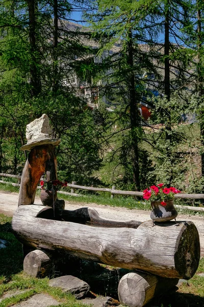 Water Fountain Carved in Wood - Swiss Alps - Zermatt, Switzerland