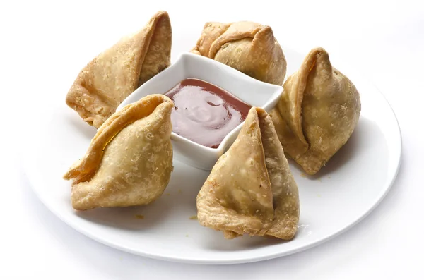 美味五香三角菜饺，传统印度小吃 图库图片