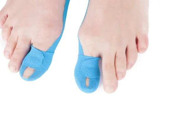 Therapeutic tape on female toe. — Stock Photo, Image