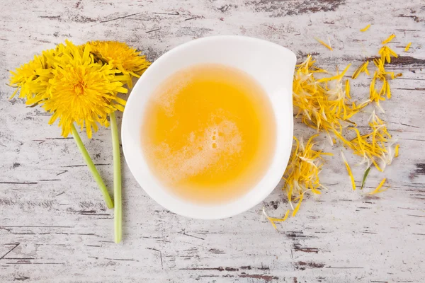 Dandelion honey background, herbal remedy. — Stock Photo, Image