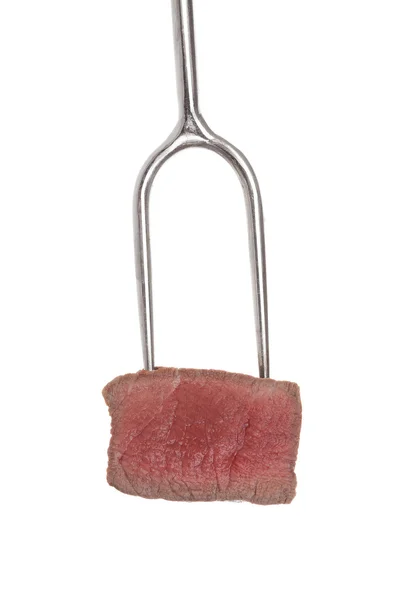 Steak on fork isolated. — Stock Photo, Image