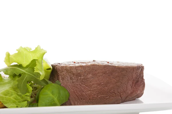 Big steak with salad. — Stock Photo, Image