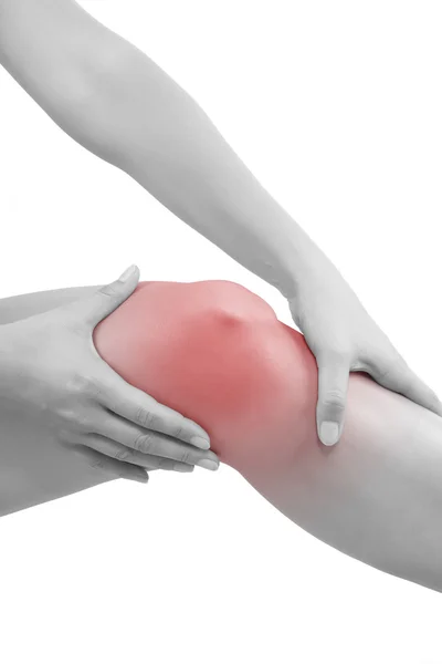 Donna che tiene il ginocchio con zona di dolore evidenziata — Foto Stock