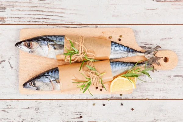 Delicious fresh fish on cutting board — Stock Photo, Image