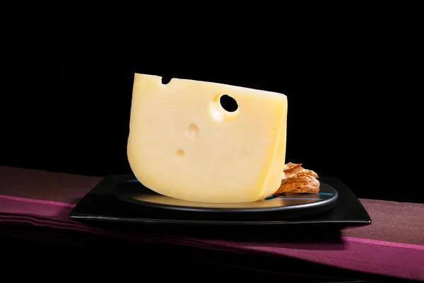 Luxurious emmental cheese still life. — Stock Photo, Image