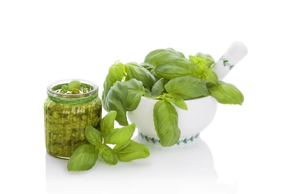 Basil pesto with ingredients. — Stock Photo, Image