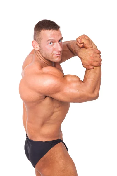 Bodybuilder poserer . - Stock-foto