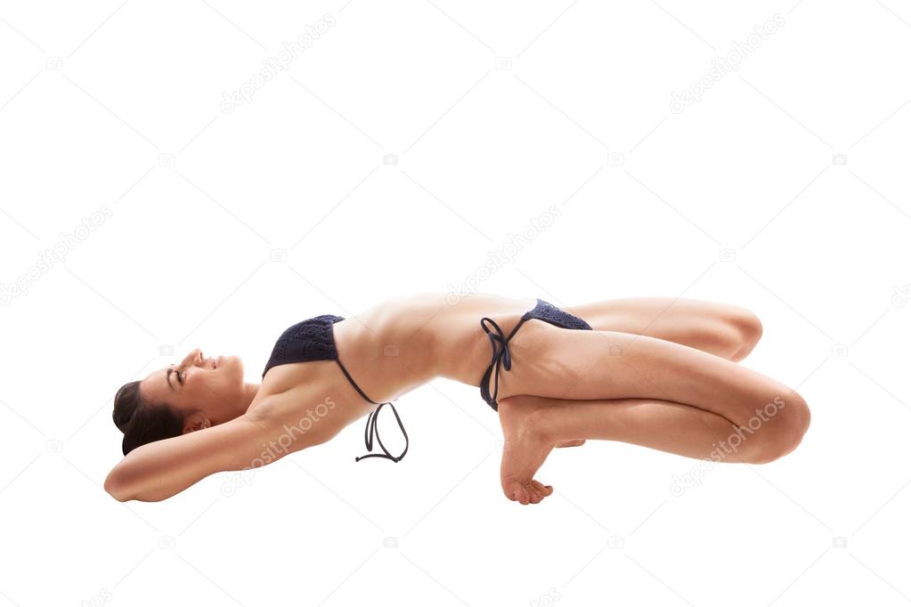 Fit girl doing bridge exercise Stock Photo by ©eskymaks 72685515