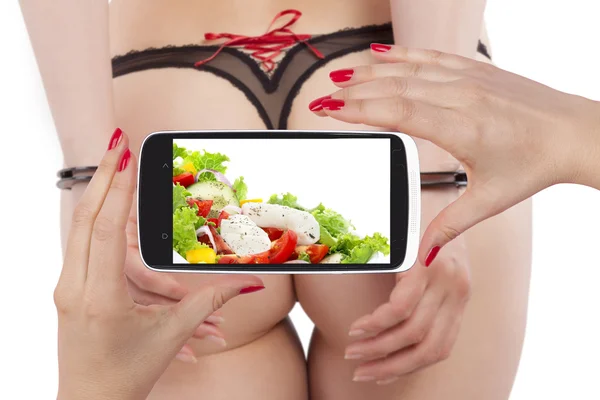 Сексуальний і здоровий на екрані смартфона — стокове фото