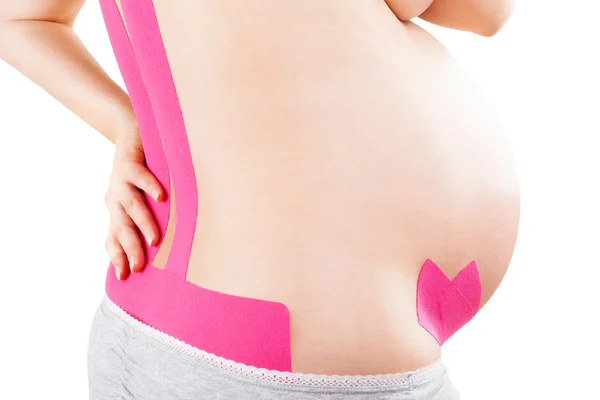 Kinesio pásky na těhotné. — Stock fotografie