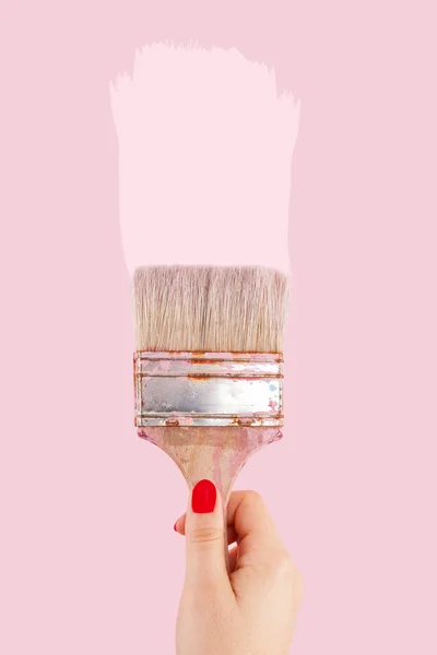 Female hand holding Paintbrush isolated. — Stock Photo, Image