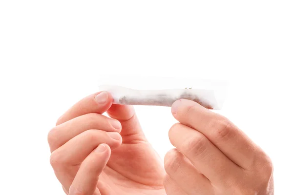 Rolling a reefer. — Stock Photo, Image