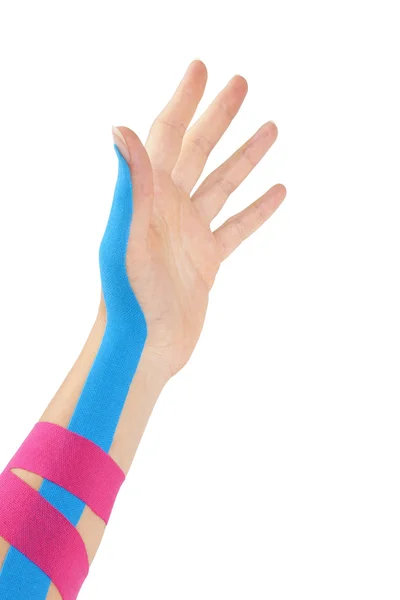 Kinesio tape on female hand. — Stock Photo, Image