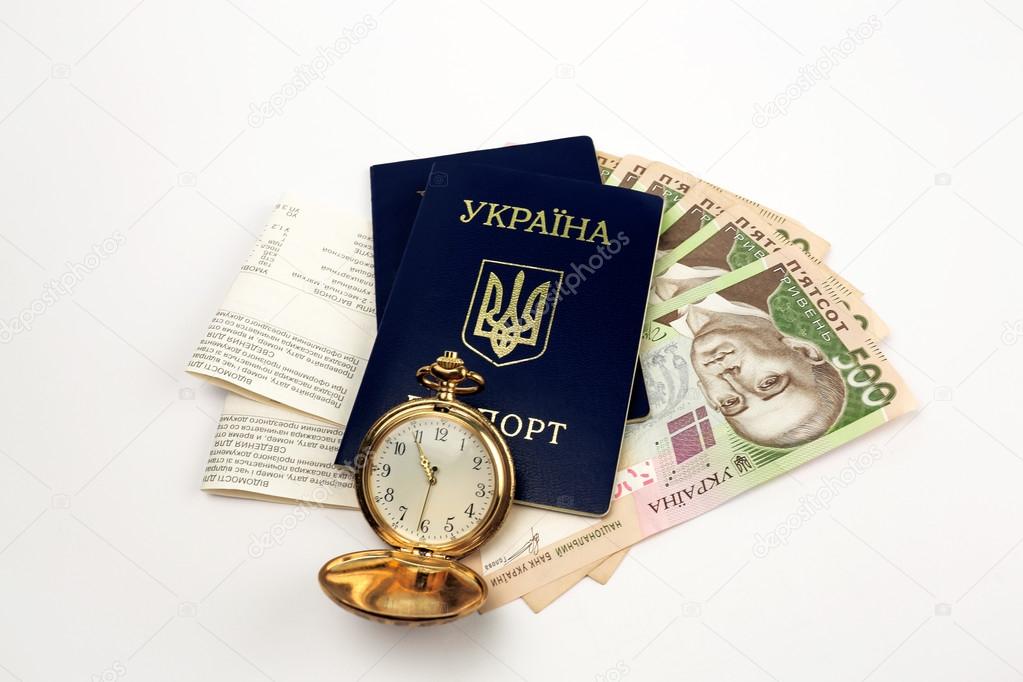 Tickets, passport Ukraine on background Bell