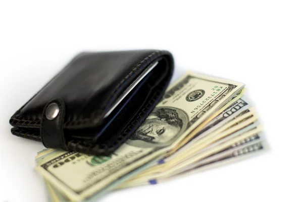 Чёрный бумажник с долларами — стоковое фото