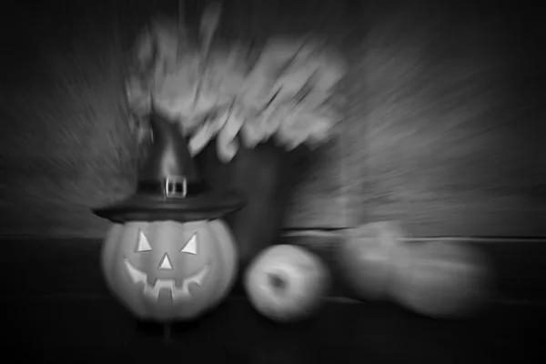 Pumpkin doll and apple on wooden background — Stock Photo, Image