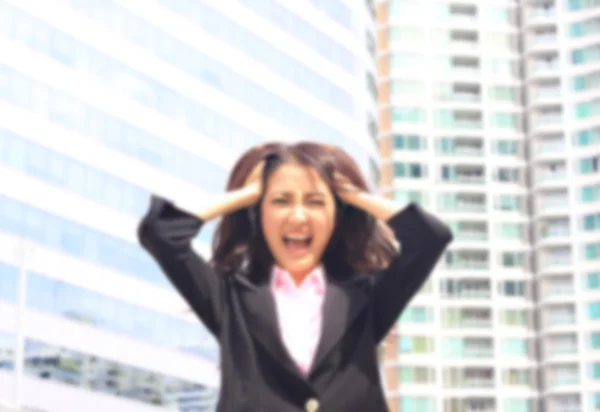 Close up portrait of Asian woman in business suite