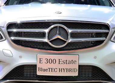 close up logo on bumper of Mercedes Benz  clipart
