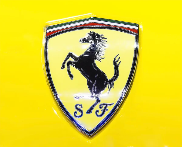 Logo of Ferrari on yellow super sport car — Stockfoto