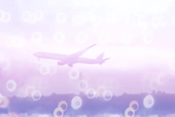 Air plane over sky with ring Bokeh — Stock Photo, Image