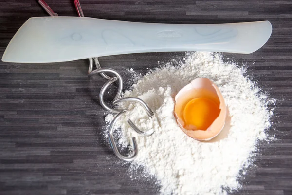 Baking ingredients on dark — Stock Photo, Image