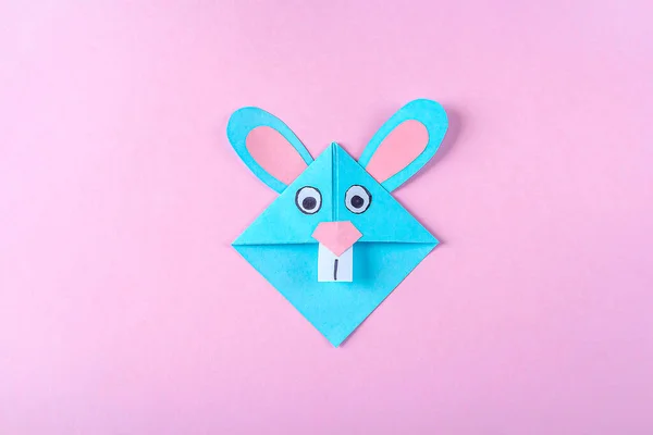 DIY and kid\'s creativity, origami. Step by step instruction: how to make bookmark easter bunny. Step 9 Finished bookmark for book, funny rabbit. Easter craft