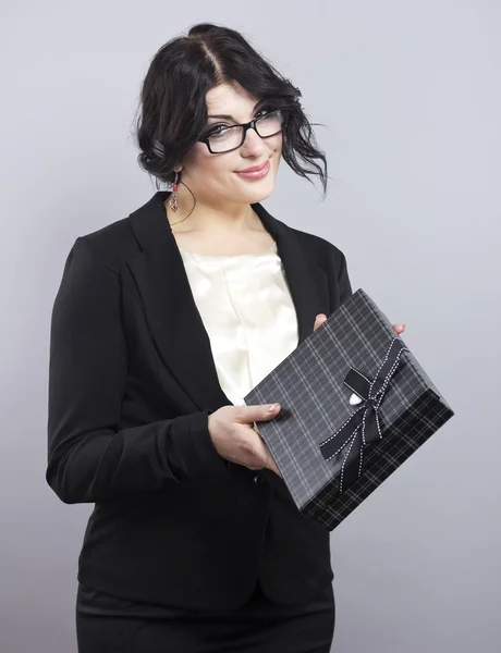 Sexy brunette. Business woman in a simple jacket. Woman wearing glasses — Stock Photo, Image