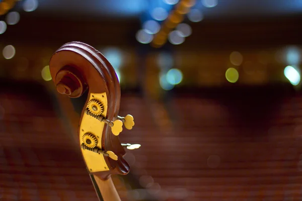 Contrabass on stage in front of an empty hall — Stock Photo, Image