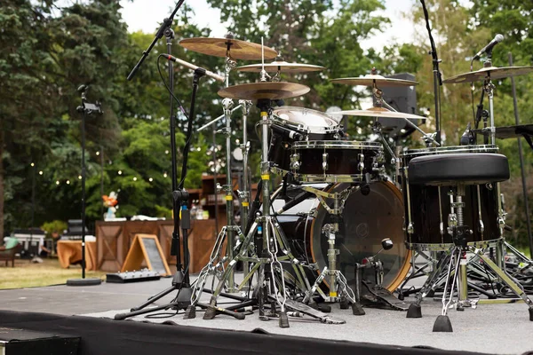 Outdoor drum kit. Live music concert in the park.
