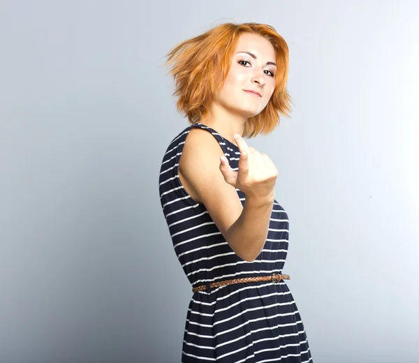 Beautiful young girl in a short cocktail dress. Fashion portrait. hair style — Stock Photo, Image