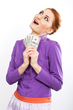 Young girl with bright hundred dollar bills in her  hands. Business woman. bank employee