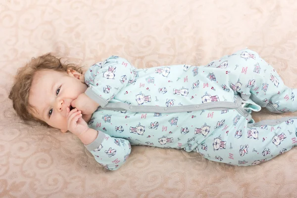 Beautiful baby .The child in the crib — Stock Photo, Image