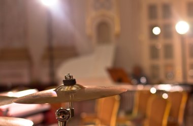 Percussion instrument. A plate of copper. Drums. Musical instruments in the concert hall.