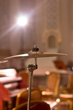 Percussion instrument. A plate of copper. Drums. Musical instruments in the concert hall.