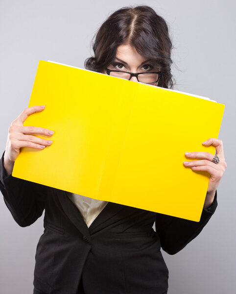 Young attractive teacher in glasses.