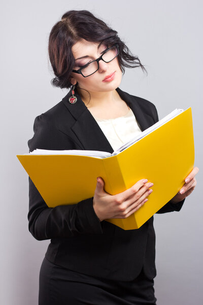 Young attractive teacher in glasses.
