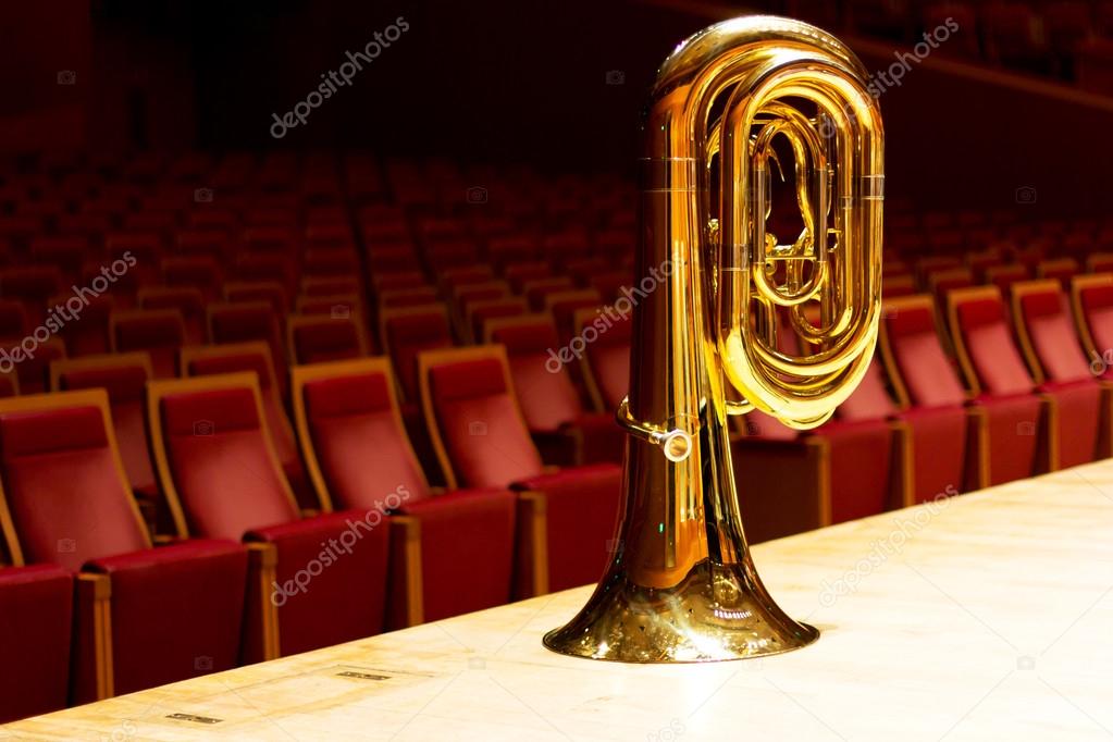 Golden tuba in the concert hall.Wind instrument. Copper musical