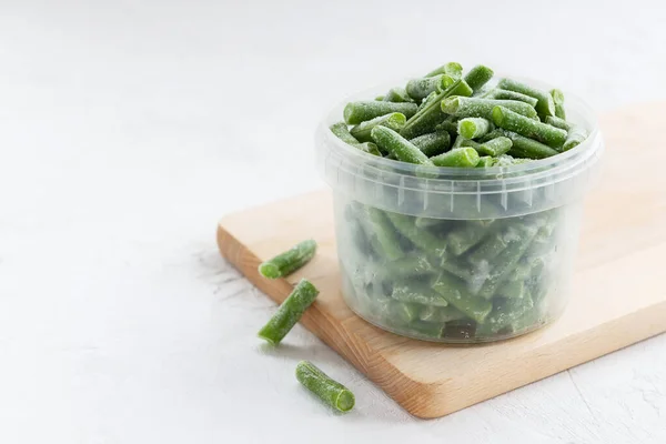 Frozen Green Beans Container Wooden Board — Stock Photo, Image