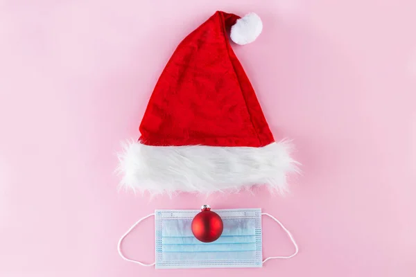 Santa Claus Hat Christmas Ball Mask Pink Background Christmas New — Stock Photo, Image