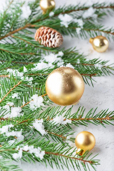 Fir Branches Decorated Golden Christmas Balls Cones Light Background Christmas — Stock Photo, Image