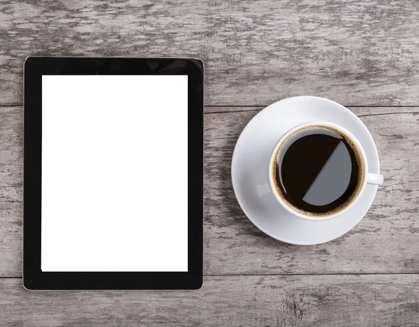 Empty tablet with note paper and coffee on the wooden table — Stock Photo, Image