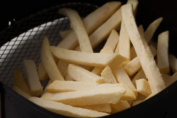 Заморозить картошку фри покрупнее — стоковое фото