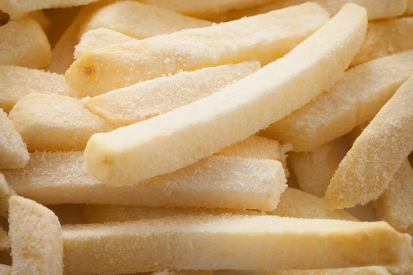 Congelamento batatas fritas francês close up flat lay — Fotografia de Stock